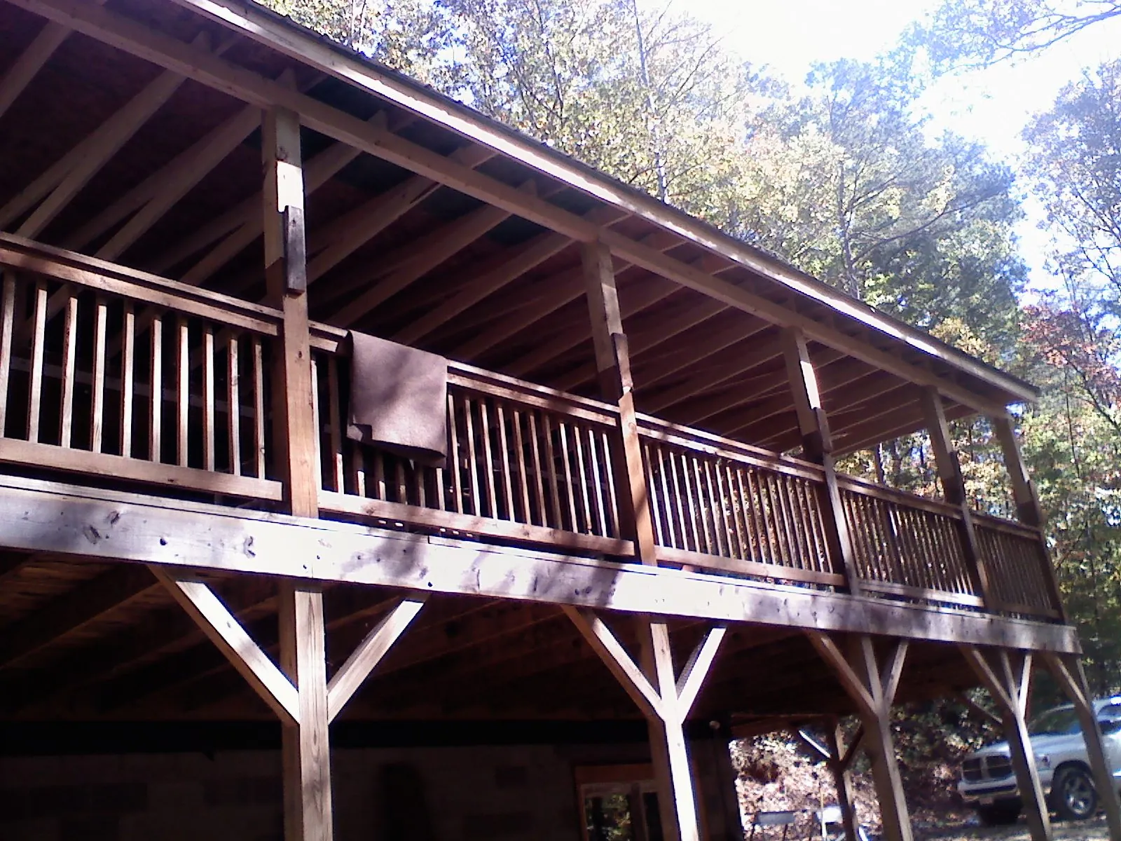 Timber framing under a new elevated porch and deck — Roof Leak Repair in Swannanoa by Roofing Brothers